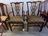 TWO MAHOGANY ARM CHAIRS CARVED ARMS AND BACKS