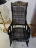 ANTIQUE HAND PAINTED LADYS ROCKER WITH BASKET WEAVE SEAT AND BACK