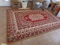 HAND KNOTTED RUG APPROX 6 FEET X 9 FEET