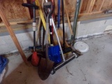 ASSORTMENT OF YARD TOOLS RAKES SHOVELS WEED WACKER AND MORE