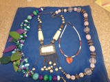 SEVERAL NECKLACES