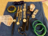 LOT OF WOMEN WATCHES BRACELETS AND MORE