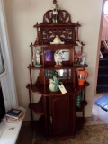 CARVED CURIO CABINET MAHOGANY SIX TIER WITH BEVELED MIRRORS APPROX 6 FEET T