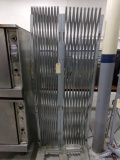 TWO ROLLING 160 INCH BY 75 INCH COLLAPSING SECURITY METAL BARRIERS