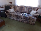 UPHOLSTERED FLORAL MOTIFF SOFA WITH A GOOSE NECK ROCKER