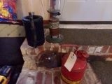 OIL AND GAS CANS AND ANTIQUE SAW AND PROPANE LANTERN