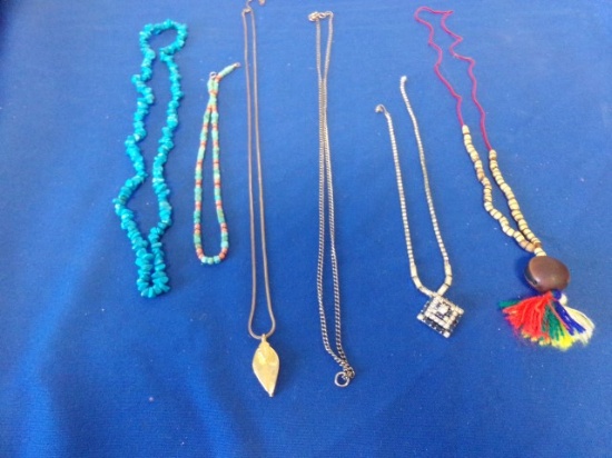 MISC NECKLACES INCLUDING TURQ. & CARVED FISH