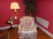 BRASS FLOOR LAMP FLORAL ARMCHAIR AND ARTIFICIAL TREE