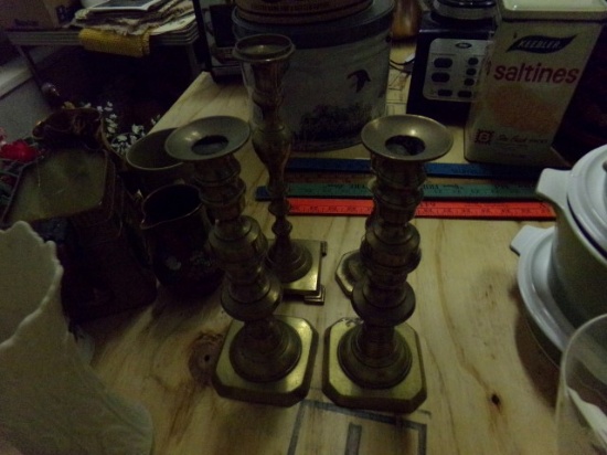 4 BRASS CANDLE STICKS 2 ARE PUSHUP