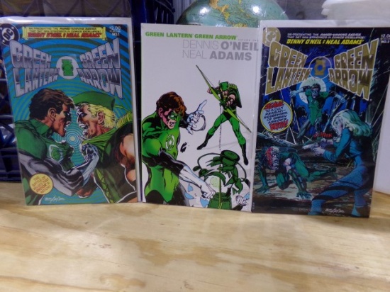LOT OF GREEN LANTERN AND GREEN ARROW COMICS NUMBERS 1 THROUGH 7 AND TWO BOO