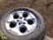 #2420 4 LIGHTLY USED BRIDGESTONE DUELER A/T P255 70R18 ON JEEP 5 LUG WHEELS