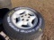 #2421 4 USED BF GOODRICH RADIAL LONG TRAIL T/A P235 70R15 ON CHEVY 5 LUG WH