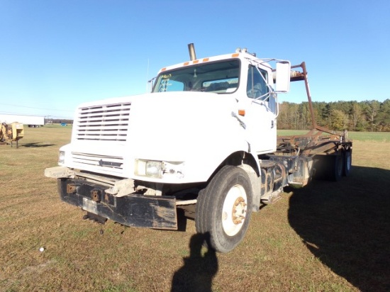 #4603 1999 INTERNATIONAL ROLL OFF 10 WHEELER SHOWING 14126 MILES ACTUAL MIL