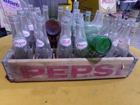 WOODEN PEPSI CRATE FULL OF PEPSI BOTTLES AND MONUMENTAL BREWING CO BOTTLE B