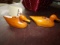 PAIR OF MINIATURE CARVED DUCK CANDLE HOLDERS SIGNED ALBERT JONES 1977