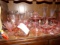 COLLECTION OF MOSTLY PINK GLASS INCLUDING PEDESTAL BOWLS COVERED BUTTER CAN