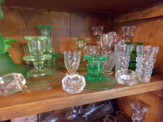 COLLECTION OF GREEN GLASS INCLUDING CANDLE HOLDERS CANDELABRAS AND CLEAR GL