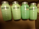 SET OF FOUR JADEITE SHAKERS SUGAR PEPPER  AND TWO FLOURS