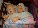 BED WITH TWO DOLLS