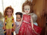 COLLECTION OF NINE DOLLS ON STANDS VARIOUS STYLES AND SIZES