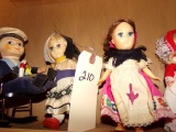 SHELF LOT INCLUDING NINE SMALL DOLLS APPROXIMATELY 8