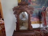 INGRAHAM GINGER BREAD MANTEL CLOCK APPROXIMATELY 22 X 14