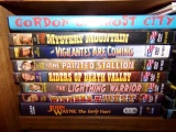 SHELF OF DVD MOVIES INLCUDING MYSTERY MOUNTAIN JOHN WAYNE THE EARLY YEARS C