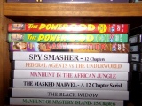 SHELF OF DVD MOVIES INCLUDING THE POWER DOG TALESPIN TOMMY THE GREEN ARCHER