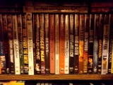 CABINET FULL OF DVDS APPROXIMATELY 100 INCLUDING STEVE MCQUEEN BOX SET  BAT