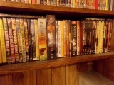 SHELF LOT FULL OF DVDS OVER 100 INCLUDING HOP ALONG CASSIDY THE DEVIL AT 4