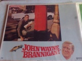 EIGHT 14X11 MOVIE POSTERS INCLUDING TWO JOHN WAYNE BRANNIGAN TWO A DOG OF F