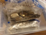 SMALL PLASTIC TOTE FULL OF SILVERPLATE FLATWARE