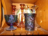 TWO SHELVES WITH CARNIVAL GLASS GRAPE AND ROSE PATTERN MINIATURE CANDLE HOL