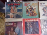 12 VINYL ALBUMS INCLUDING 5 JAMES BOND SOUNDTRACKS DR NO THE MAN WITH GOLDE