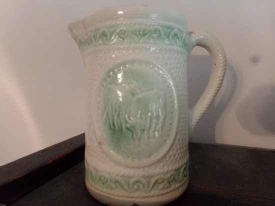 8 INCH WHITE AND LIGHT GREEN PITCHER WITH CATTLE DESIGN