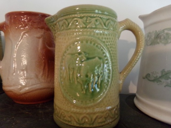 8 INCH PITCHER WITH SWIRL DESIGN AND CATTLE GREEN AND CREAM