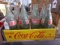 WOODEN COCA COLA CRATE WITH EIGHT 32 OUNCE COCA COLA BOTTLES