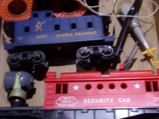 BOX LOT OF LIONEL SECURITY CAR #3535 AND #6027 ALASKA AND LIONEL HELICOPTER