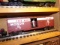 SET OF FOUR LIONEL BOX CARS ERIE 9307 TRAINS AND TRUCKIN 7803 AND 9389 RADI