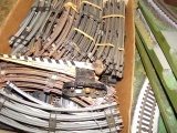 BOX OF O27 TRACK AND HO TRACK MOUNTED ON SCENERY