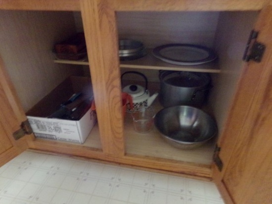 CONTENTS OF KITCHEN CABINETS INLCUDING KNIVES BAKING DISHES BOWLS AND MORE