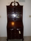 MAHOGANY SLANT FRONT SECRETARY DESK WITH LATTICE FRONT DOORS AND BROKEN ARC