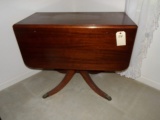 MAHOGANY DROP LEAF TABLE WITH BRASS CAP FEET