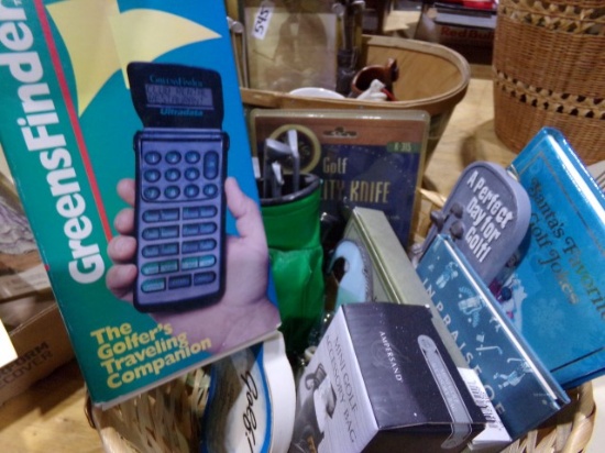 BASKET WITH GOLFING COLLECTIBLES INCLUDING KNIFE CALCULATORS AND MORE