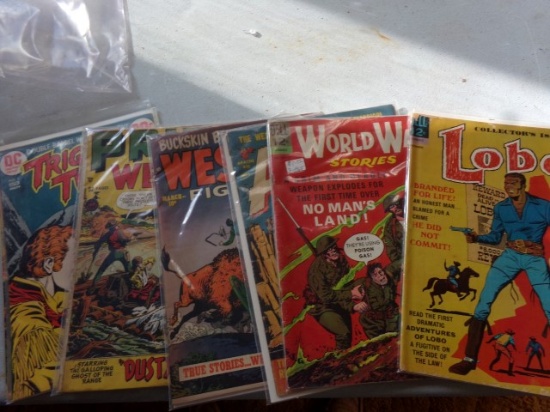 SEVEN COMIC BOOKS INCLUDING DELL LOBO DECEMBER AND DELL WORLD WAR STORIES A