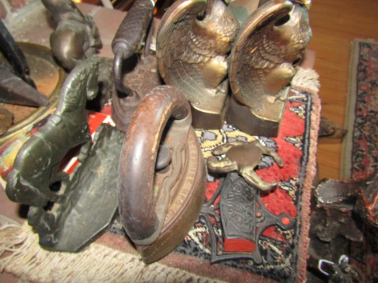 COLLECTION OF ANTIQUE IRONS BOOK ENDS AND MINIATURE RUG