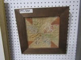SQUARE OF PATCHWORK QUILT FRAMED UNDER GLASS 14 X 14