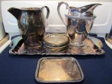 SILVER PLATE PITCHERS TRAYS AND WINE COASTERS