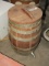 EARLY WOODEN KEG APPROXIMATELY 17 INCH X 11 INCH ACROSS