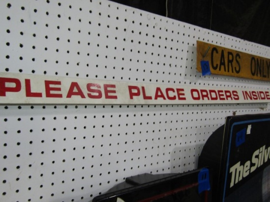 SIGN THAT READS PLEASE PLACE ORDERS INSIDE APPROXIMATELY 48 INCH X 3 INCH